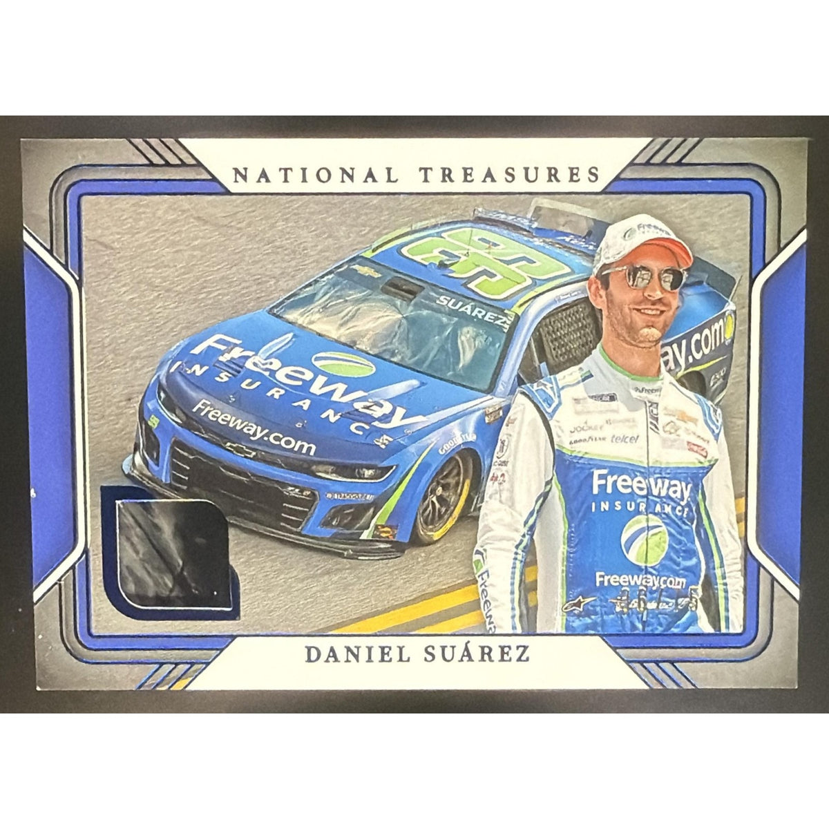 2025 Panini National Treasures Daniel Suarez #8 Track Gear Blue /75