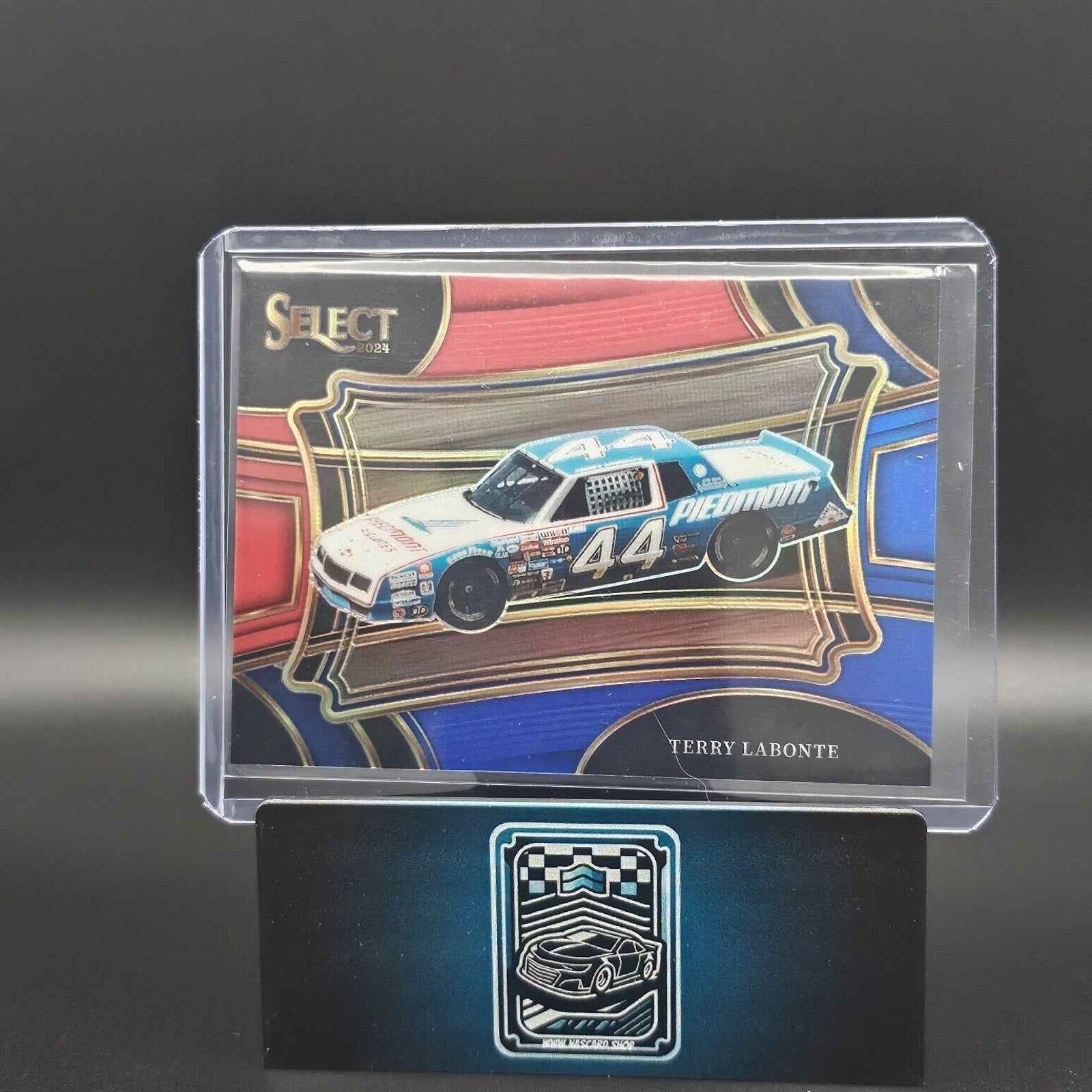 2024 Panini Select - Pit Road Red and Blue Prizm #185 Terry Labonte /149 - NASCARD.shop