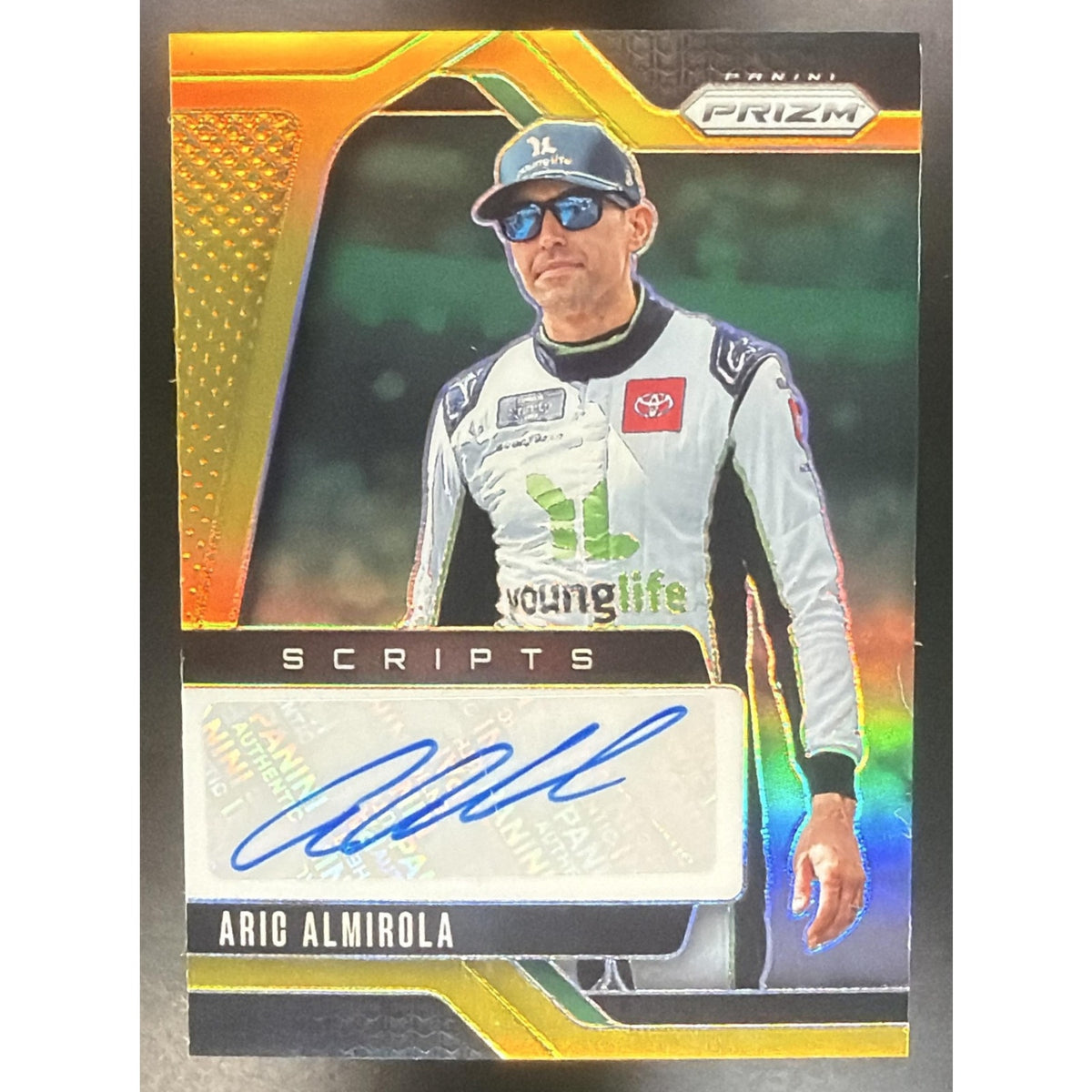 2025 Panini Prizm Racing Scripts Gold Aric Almirola 04/10