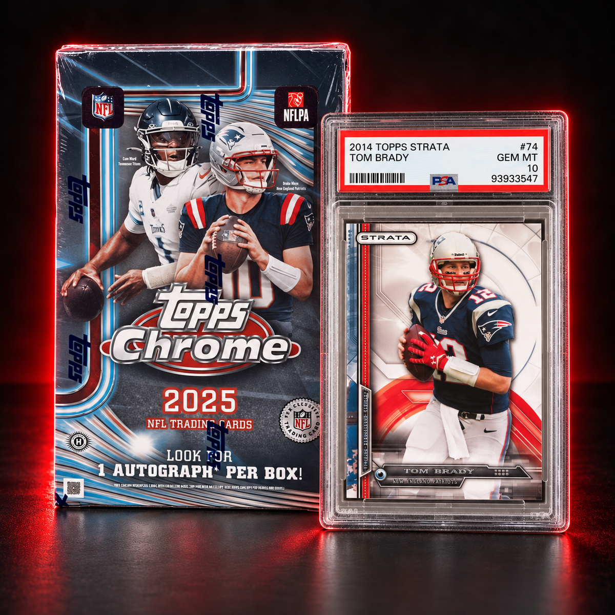 A 2025 Topps Chrome NFL trading card box stands beside a PSA-graded 2014 Topps Strata Tom Brady card in a clear holder, photographed on a dark red-lit studio background.