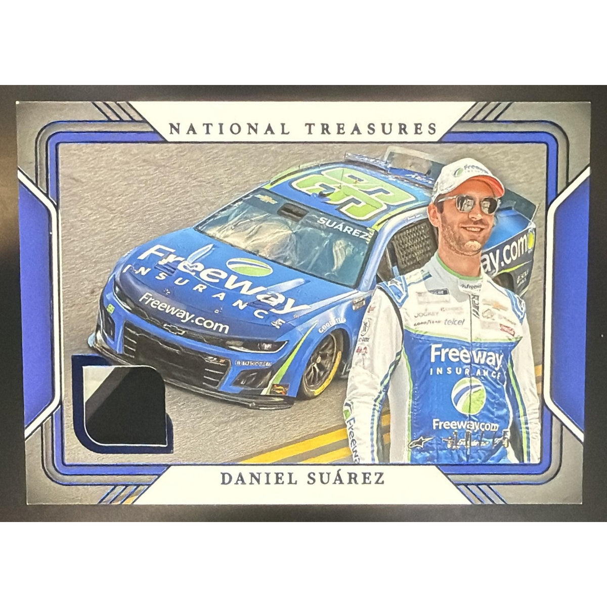 2025 Panini National Treasures Daniel Suarez #8 Track Gear Blue /75