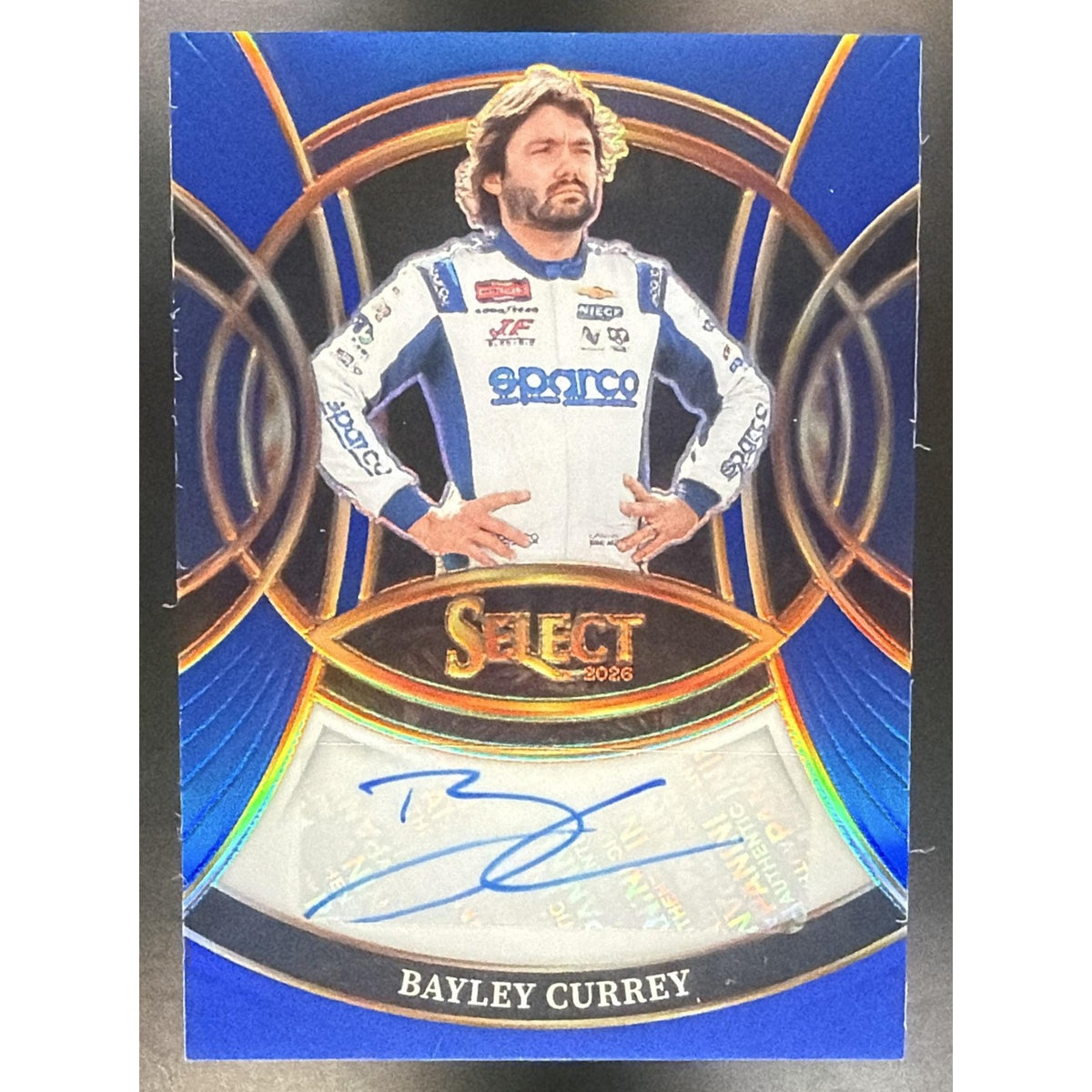 2026 Panini Select NASCAR Bayley Currey #S-BCY Signatures Blue Prizms /99 Auto